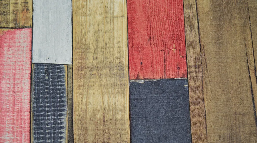 What Is Oil-Based Primer? - A vibrant arrangement of wooden planks in a rustic pattern